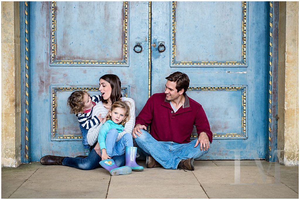 family laughing for photos