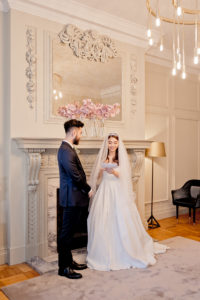 Bride and groom read vows to each other