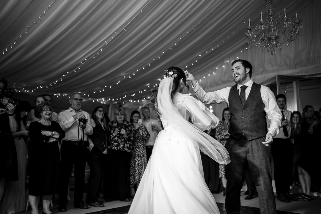 Garthmyl Hall wedding photographer capturing the first dance in the marquee