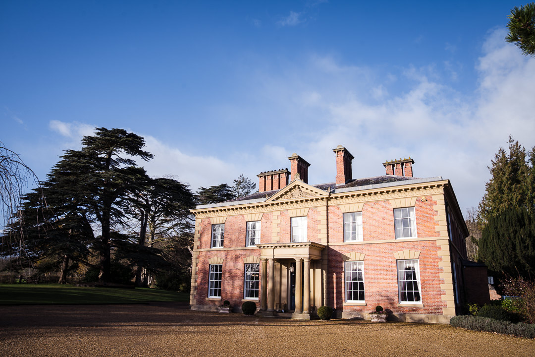 Garthmyl Hall wedding photographer capturing the Georgian frontage with columned portico