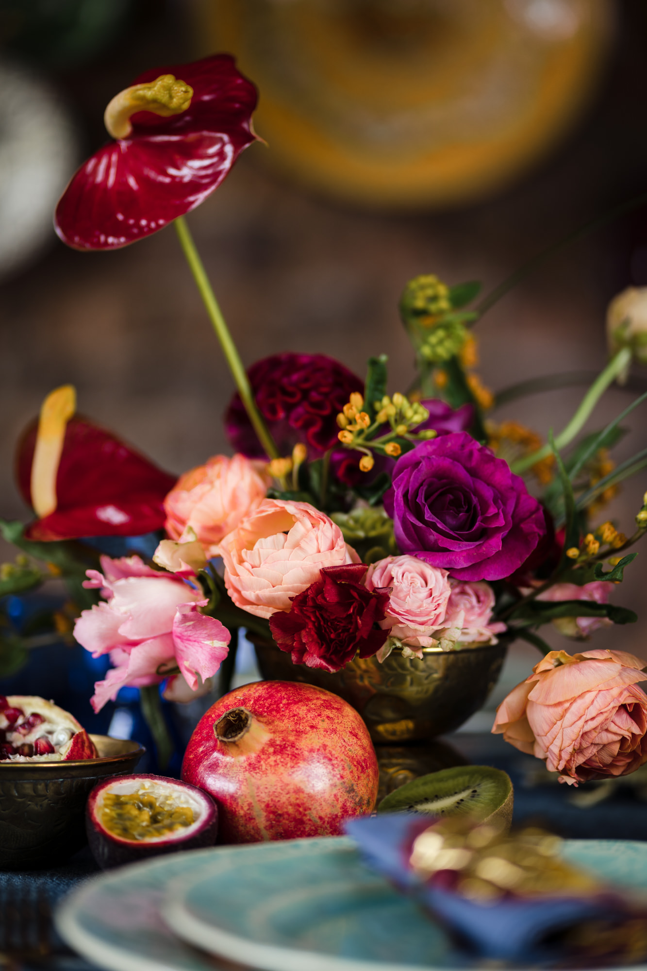 bold colourful floral table centre pieces for weddings