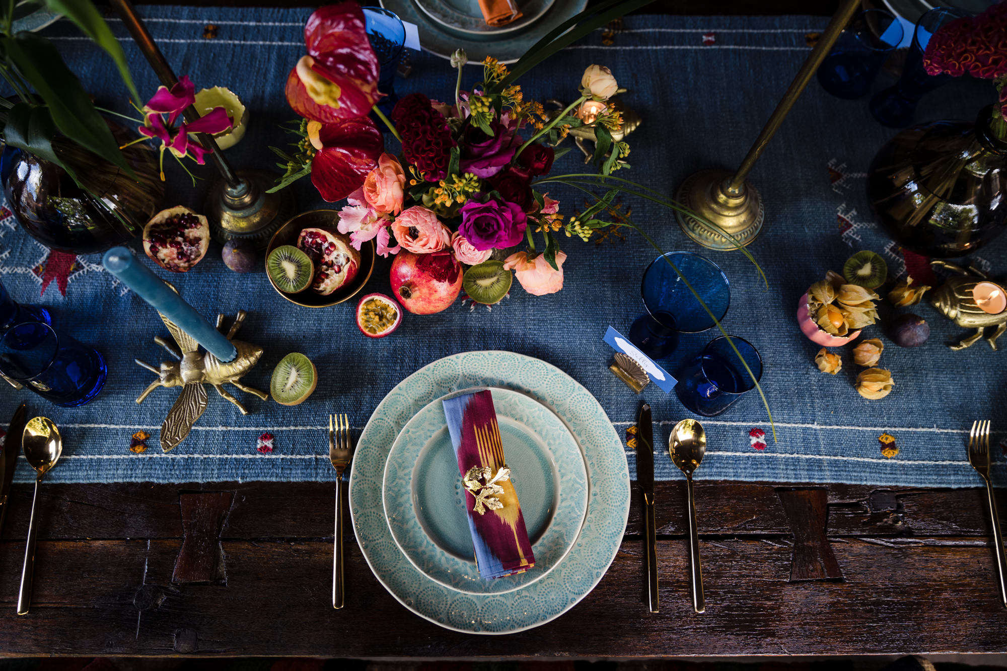 a wedding table inspiration of bold colourful styling for a small dinner wedding