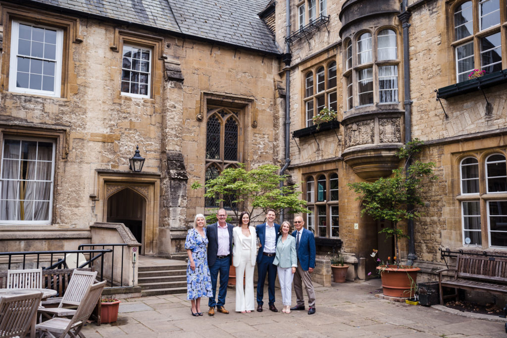 family wedding group photo at small intimate wedding at Lincoln College Oxford